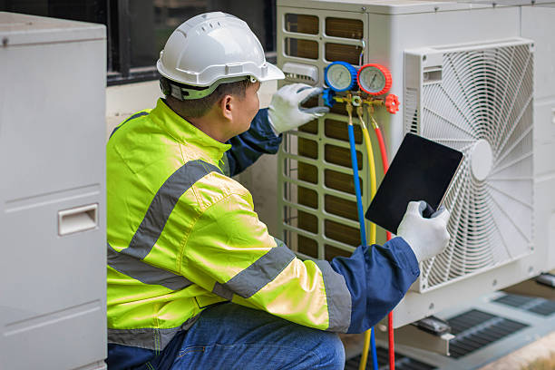 Professional Hvac technician working in Lumberton, NC